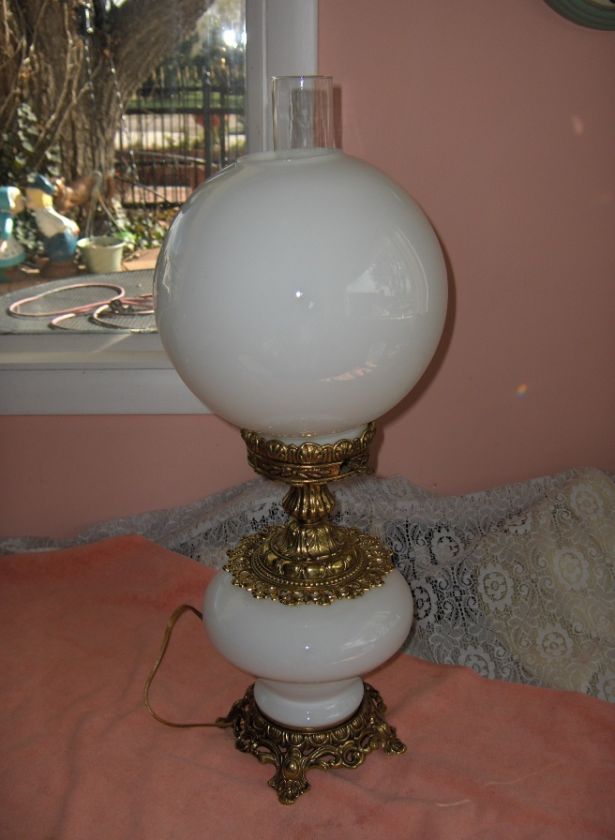 Up for sale is a beautiful vintage milk white 2 globe glass table lamp 
